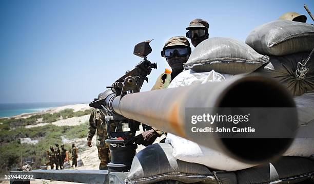 Ugandan soldiers man a 106mm recoilless rifle while patrolling for Al Shabaab positions on the frontline in Karaan district on February 20, 2012 in...