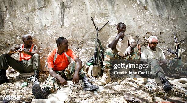 Burundi soldiers reinforce positions in a building taken from al Shabaab militants two days before near Afgooye on February 20, 2012 in Mogadishu,...