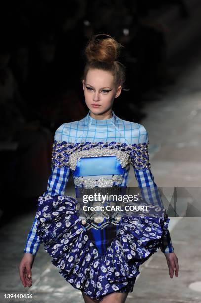 Model presents a creation by Greek designer Mary Katrantzou during the 2012 Autumn/Winter collection catwalk show at London Fashion Week in London on...