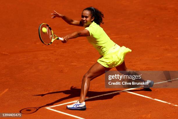 Leylah Fernandez of Canada plays a backhand against Andrea Petkovic of Germany in their first round match during day two of the Mutua Madrid Open at...