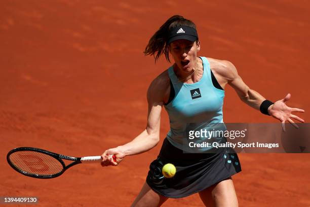 Andrea Petkovic of Germany returns a ball to Leylah Fernandez of Canada during Day Two of Mutua Madrid Open at La Caja Magica on April 29, 2022 in...
