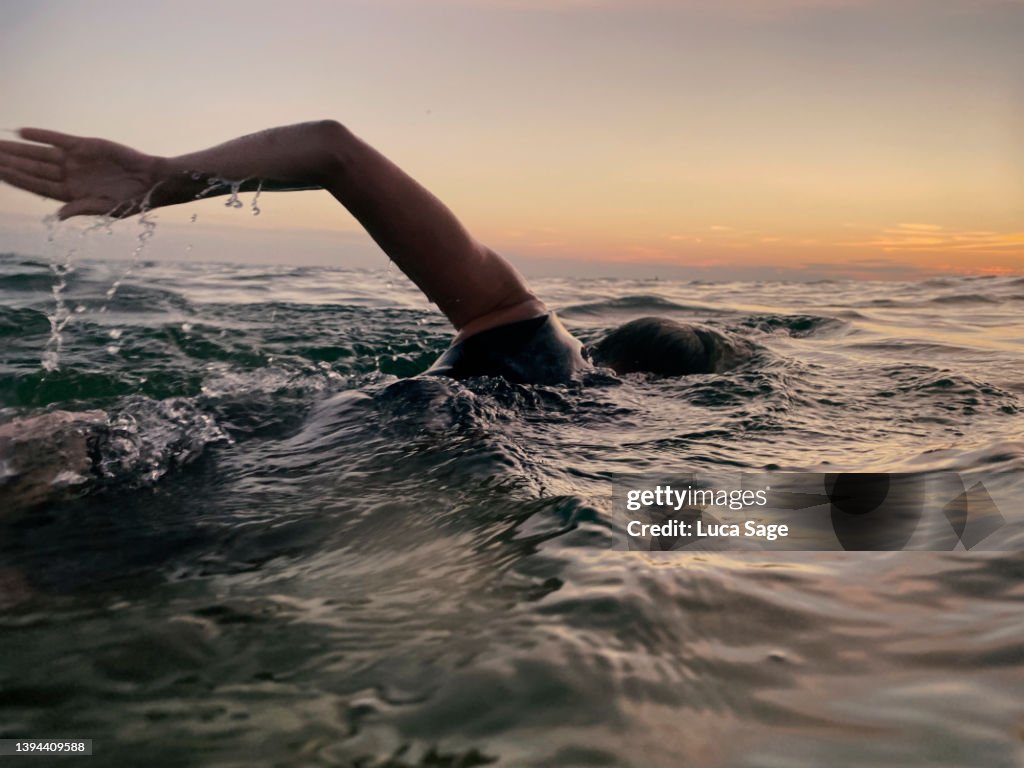 Female Sea Swimmer at sunset