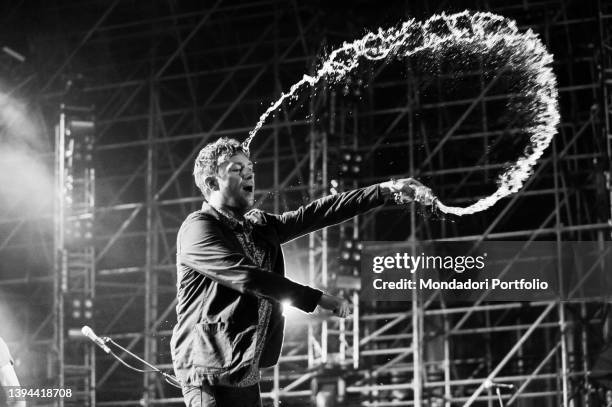 This image has been converted to black and white) Singer Damon Albarn of the British musical group Blur performs live during a concert at the Rock...