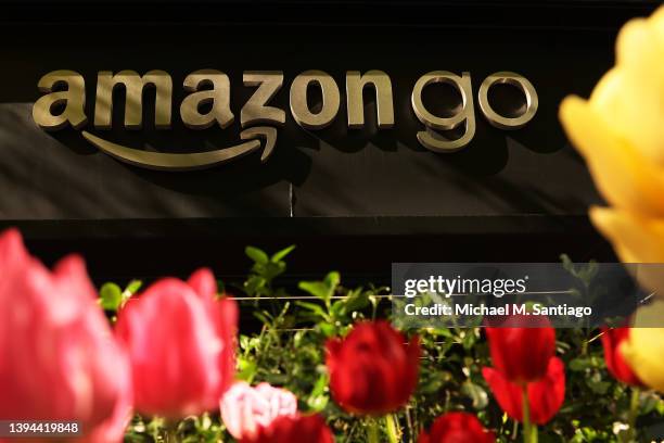 An Amazon Go store signage is seen in the Financial District on April 29, 2022 in New York City. Amazon this week reported a net loss of $3.8 billion...