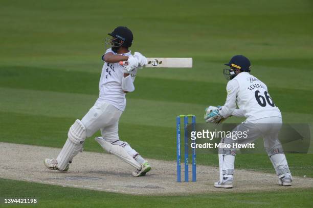 Cheteshwar Pujara of Sussex hits a boundary to bring up his half centuryduring the LV= Insurance County Championship match between Sussex and Durham...