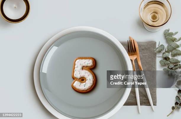 number five cookie in a ceramic plate  top view.copy space - table numbers stock pictures, royalty-free photos & images
