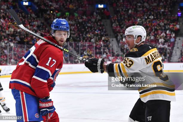 Josh Anderson of the Montreal Canadiens takes a high-stick to the face from Brad Marchand of the Boston Bruins in the NHL game at the Bell Centre on...