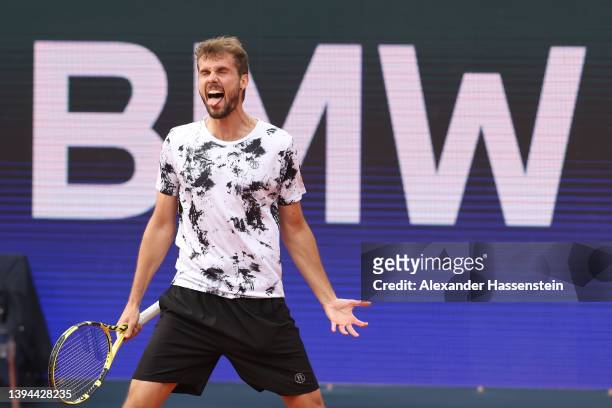 Oscar otte of Germany celebrates victory after winning his quater-final match against Alejandro Tabilo of Chile on day seven of the BMW Open by...