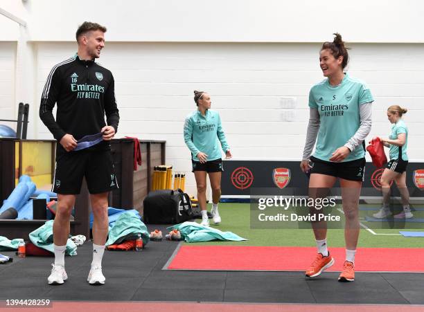 Rob Holding and Jennifer Beattie of Arsenal during the Arsenal Women's training session at London Colney on April 29, 2022 in St Albans, England.