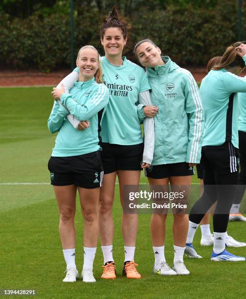 Jennifer Beattie, Beth Mead and Steph Catley of Arsenal during the Arsenal Women's training session at London Colney on April 29, 2022 in St Albans,...