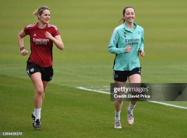 Anna Patten of Arsenal running with an Arsenal Women's Physio during the Arsenal Women's training session at London Colney on April 29, 2022 in St...