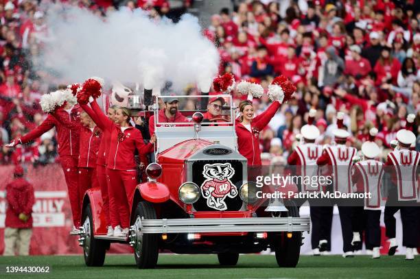 The Bucky Wagon and cheerleaders of the Wisconsin Badgers ride on the field before the game against the Nebraska Cornhuskers at Camp Randall Stadium...