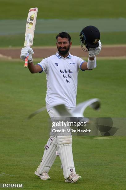 Cheteshwar Pujara of Sussex celebrates reaching his century during the LV= Insurance County Championship match between Sussex and Durham at The 1st...