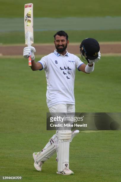 Cheteshwar Pujara of Sussex celebrates reaching his century during the LV= Insurance County Championship match between Sussex and Durham at The 1st...