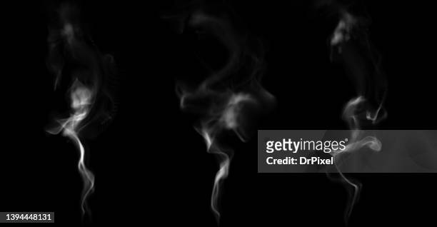 smoke or steam on black - gas di scarico foto e immagini stock