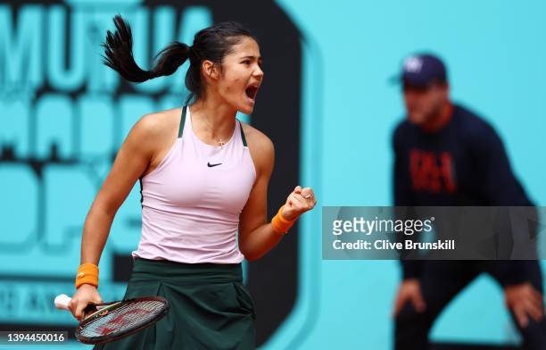 Emma Raducanu of Great Britain reacts in their first round match against Tereza Martincova of Czech Republic during day two of the Mutua Madrid Open...
