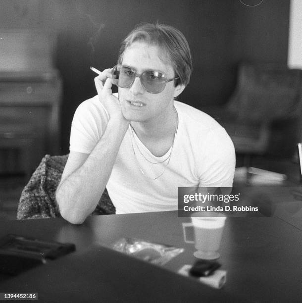 Singer Steve Harley of the English group Cockney Rebel being interviewed in a New York record company conference room.