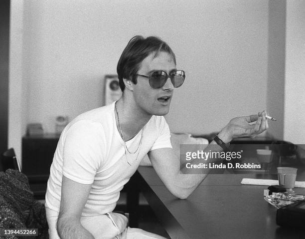 Singer Steve Harley of the English group Cockney Rebel being interviewed in a New York record company conference room.