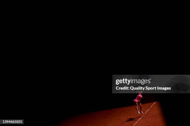 Camila Giorgi of Italy serves against Jessica Pegula of USA during Day Two of Mutua Madrid Open at La Caja Magica on April 29, 2022 in Madrid, Spain.