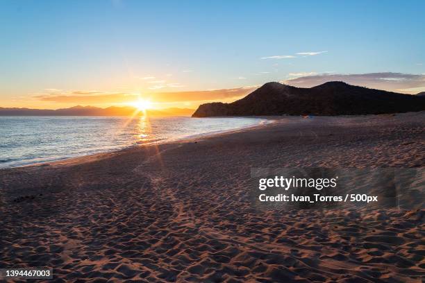 scenic view of sea against sky during sunset,el saltito,baja california sur,mexico - baja california sur stock pictures, royalty-free photos & images