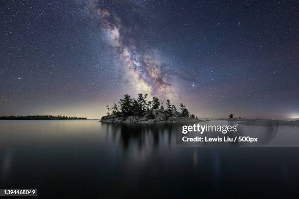 scenic view of lake against sky at night,killarney,ontario,canada - killarney canada stockfoto's en -beelden