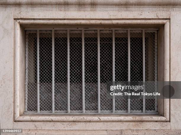 mesh_p1001090.jpg - prison window stock pictures, royalty-free photos & images