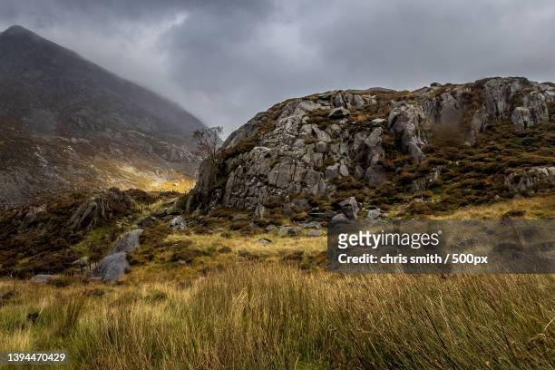 scenic view of landscape against sky - capel curig stock pictures, royalty-free photos & images