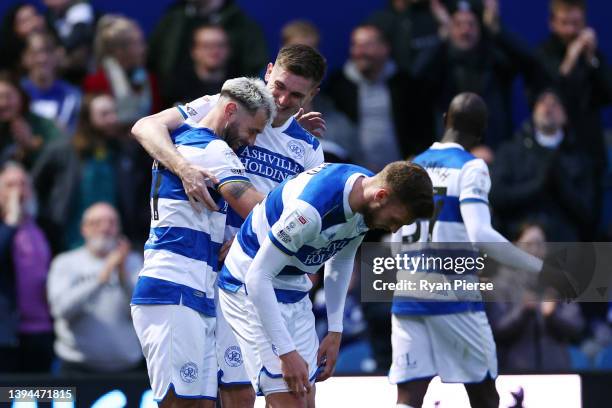 Charlie Austin of Queens Park Rangers celebrates with teammate Jimmy Dunne after scoring their team's first goal during the Sky Bet Championship...