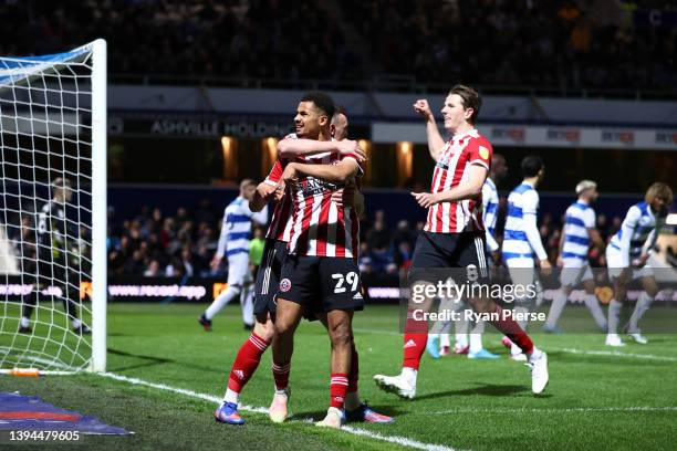 Iliman Ndiaye of Sheffield United celebrates with teammates after scoring their team's first goal during the Sky Bet Championship match between...