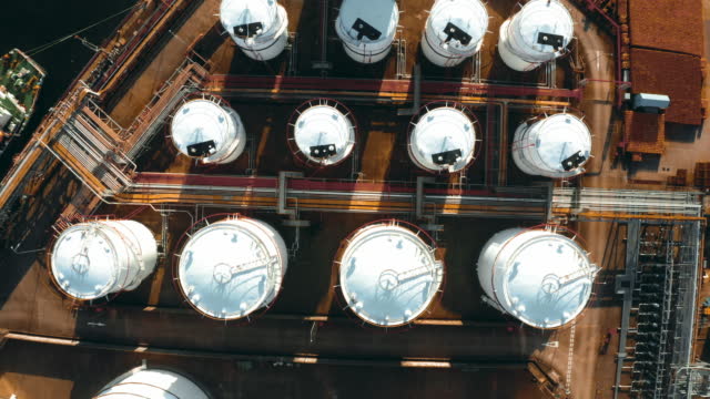 Drone aerial view oil petrochemical industrial and oil storage tank