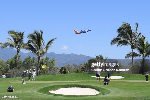 Plane departs from Aeropuerto Internacional Licenciado Gustavo Díaz Ordaz as golfers compete as Ben Crane of United States, Justin Lower of United...