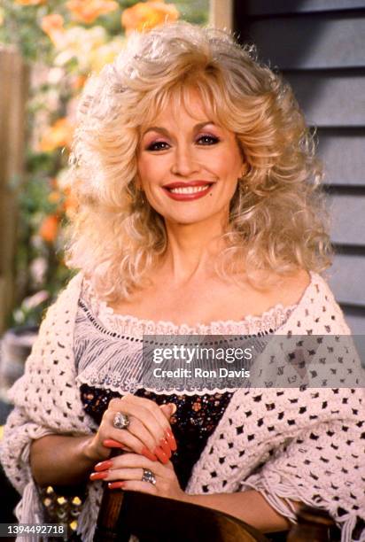American singer-songwriter, actress, and businesswoman Dolly Parton, poses for a portrait circa 1995 at Dollywood in Pigeon Forge, Tennessee.