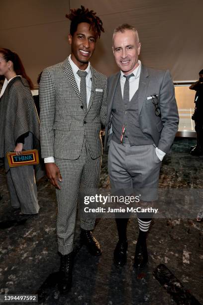 Jon Batiste and Thom Browne attend the Thom Browne Fall 2022 runway show on April 29, 2022 in New York City.