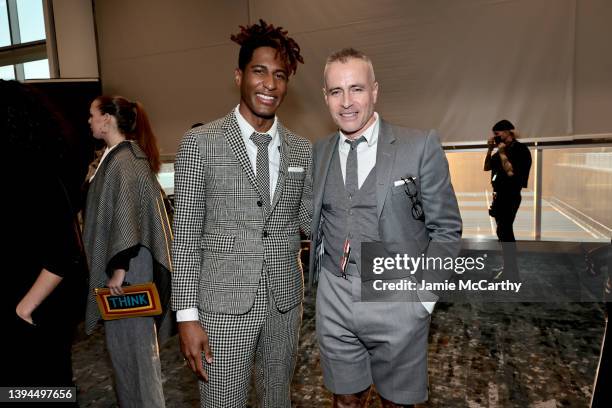 Jon Batiste and Thom Browne attend the Thom Browne Fall 2022 runway show on April 29, 2022 in New York City.