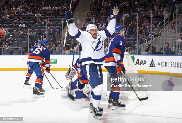 Steven Stamkos of the Tampa Bay Lightning scores against the New York Islanders at 11:57 of the second period at UBS Arena on April 29, 2022 in...
