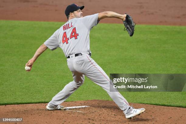 Rich Hill of the Boston Red Sox pitches in the second inning during a baseball game against the Baltimore Orioles at Oriole Park at Camden Yards on...