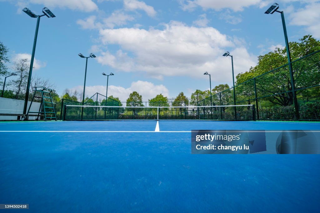 Empty blue tennis court