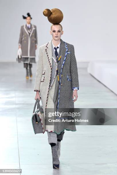 Model walks the runway for the Thom Browne Fall 2022 fashion show on April 29, 2022 in New York City.