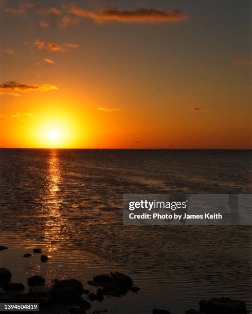 sunrise over the ocean. - sunrise fort lauderdale stock pictures, royalty-free photos & images