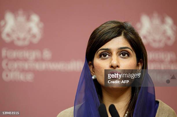 Pakistan's Foreign Minister Hina Rabbani Khar addresses a press conference with Britain's Foreign Secretary William Hague at the Foreign and...