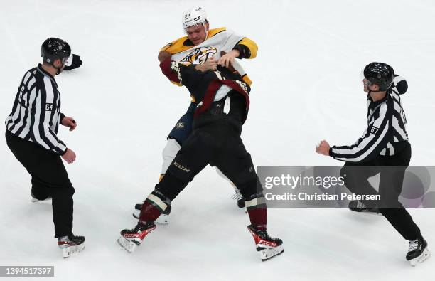 Mark Borowiecki of the Nashville Predators fights with Bokondji Imama of the Arizona Coyotes during the first period of the NHL game at Gila River...