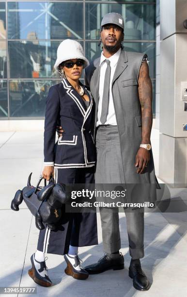 Teyana Taylor and Iman Shumpert are seen arriving to Thom Browne Fall 2022 runway show at Javits Center on April 29, 2022 in New York City.