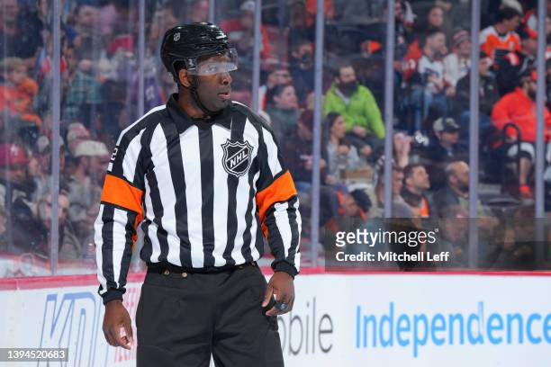 Referee Jordan Samuels-Thomas looks on during the game between the Ottawa Senators and Philadelphia Flyers at the Wells Fargo Center on April 29,...