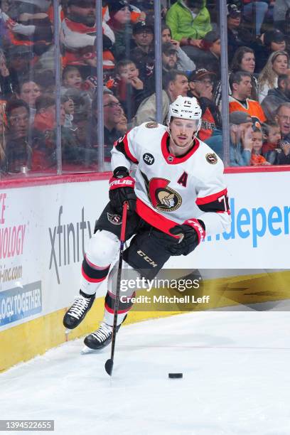 Thomas Chabot of the Ottawa Senators controls the puck against the Philadelphia Flyers at the Wells Fargo Center on April 29, 2022 in Philadelphia,...