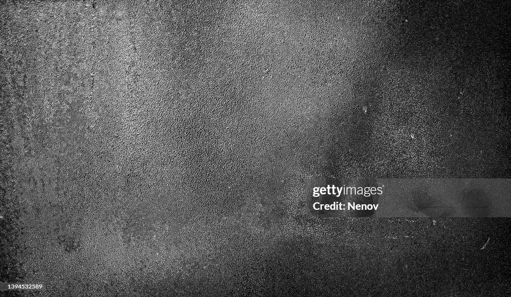 Black and white image of a metal surface