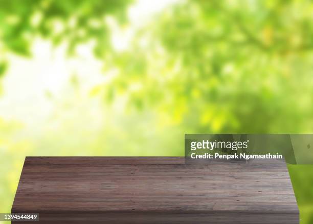 old brown wood texture background surface perspective view timber material table vintage natural or rustic grunge on bokeh green abstract nature wall background - wood grain 個照片及圖片檔