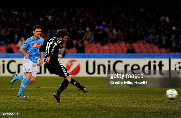 Juan Mata of Chelsea scores the opening goal during the UEFA Champions League round of 16 first leg match between SSC Napoli and Chelsea FC at Stadio...