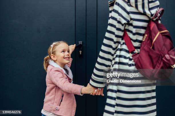 parent and pupil going to school - love is an open door stock pictures, royalty-free photos & images