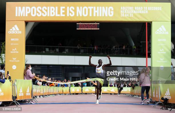 Kibiwott Kandie of Kenya celebrates as they cross the line to win the Men's 10K Race. World class road runners compete at the second annual adidas’...