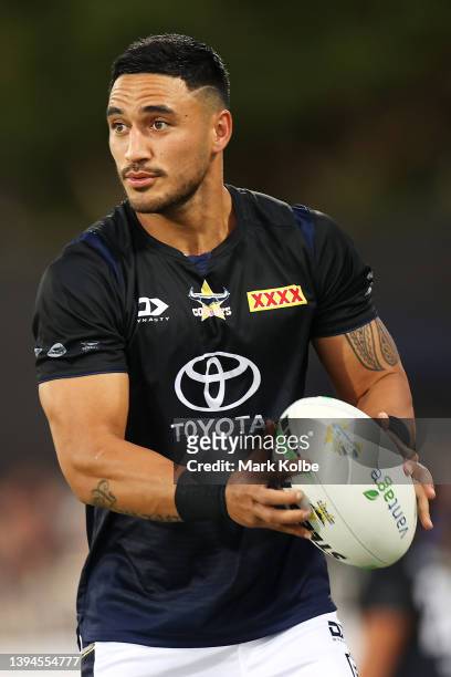 Valentine Holmes of the Cowboys passes during the warm-up before the round eight NRL match between the Parramatta Eels and the North Queensland...